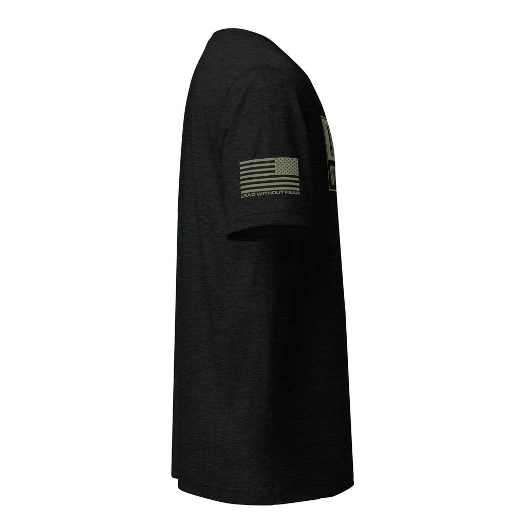 Black graphic t-shirt with a military green US Flag  print on the right sleeve. 