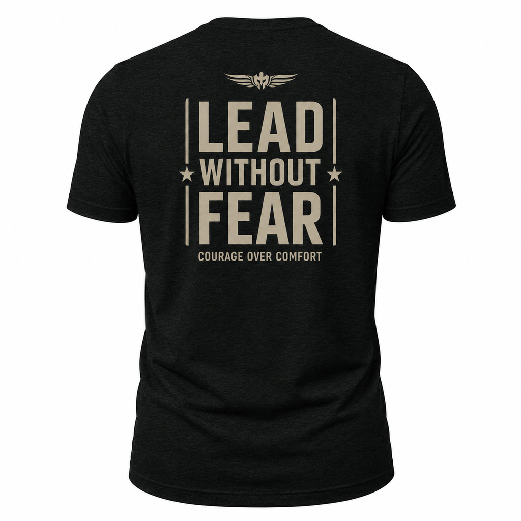 A black short-sleeve t-shirt shown from the back, featuring a distressed beige graphic print that reads 'LEAD WITHOUT FEAR' with 'COURAGE OVER COMFORT' underneath and a winged emblem above.