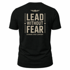 A black short-sleeve t-shirt shown from the back, featuring a distressed beige graphic print that reads 'LEAD WITHOUT FEAR' with 'COURAGE OVER COMFORT' underneath and a winged emblem above.