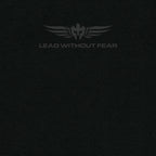 Close up of Lead Without Fear logo black shirt and black helmet with wings and LEAD WITHOUT FEAR underneath it. 