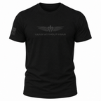 A black short-sleeve crewneck t-shirt featuring a dark gray winged emblem and the text 'LEAD WITHOUT FEAR' printed on the chest, with a small American flag graphic on the right sleeve, shown against a plain white background.