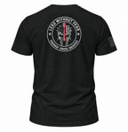 A black short-sleeve t-shirt shown from the back, featuring a large circular white graphic with a Spartan helmet, an American flag, and the text 'LEAD WITHOUT FEAR' and 'COURAGE - SERVICE - SACRifice'. A small black flag graphic is printed on the right sleeve.
