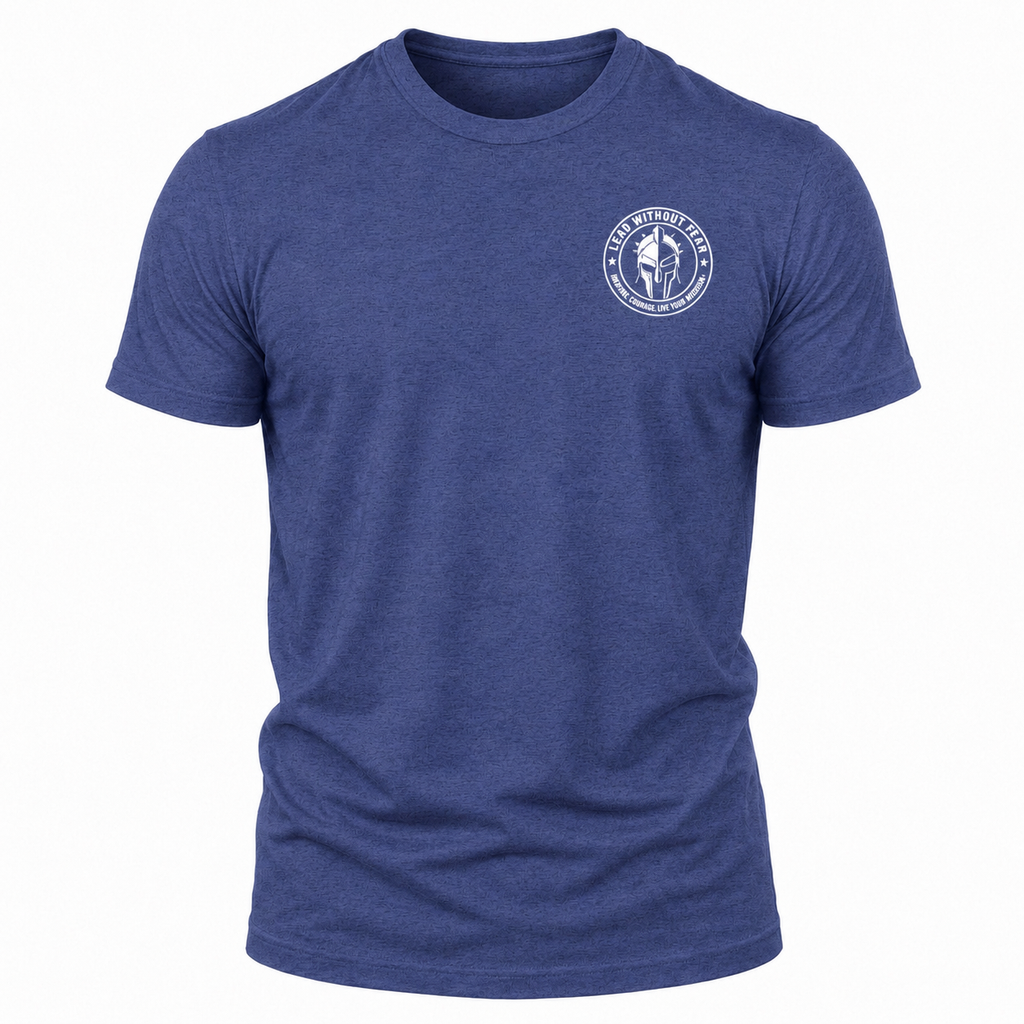 A heather blue crewneck t-shirt with a white circular lead without fear logo printed on the left chest, displayed on a clean white background.