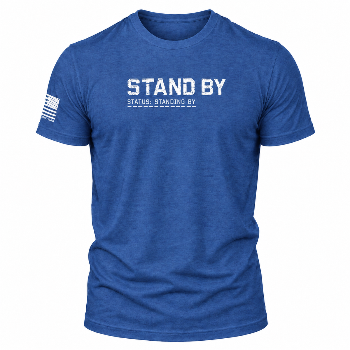 A heather blue short-sleeve t-shirt with 'STAND BY' printed in distressed white letters on the chest, with smaller text underneath and a distressed American flag graphic on the right sleeve, shown on a plain white background.