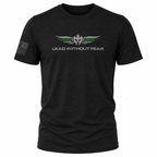 A black short-sleeve t-shirt with a 'LEAD WITHOUT FEAR' graphic on the chest featuring a winged emblem with green and white accents, and a distressed American flag on the right sleeve.