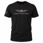 A black short-sleeve t-shirt with a 'LEAD WITHOUT FEAR' graphic on the chest featuring a winged helmet emblem in gray and red, and a distressed gray American flag on the right sleeve, shown on a plain white background.
