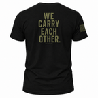 Black military style shirt with olive green graphic saying We Carry Each Other. An American Flag is on the sleeve. Patriotic Veteran Shirt.