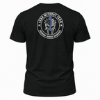 A black short-sleeve t-shirt shown from the back, featuring a circular white graphic with a Spartan helmet and a thin blue line American flag design, with the text 'LEAD WITHOUT FEAR' and 'COURAGE - SERVICE - SACRifice'.